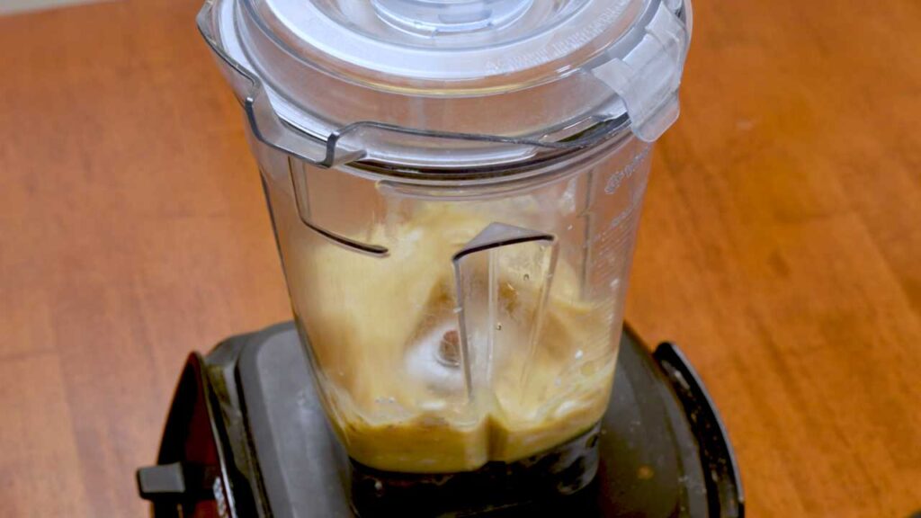 Blending eggs and cottage cheese into a smooth scramble batter