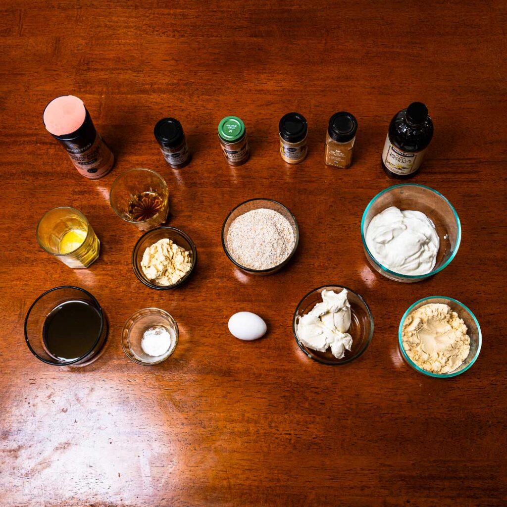 Gingerbread protein cookie ingredients, oats, butter, maple syrup, and spices